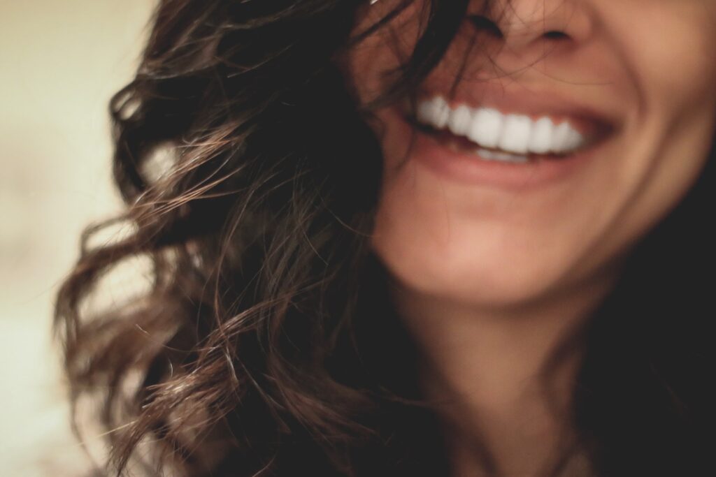 woman smiling with teeth